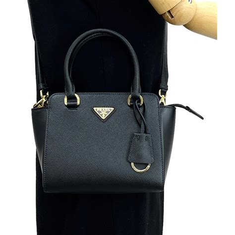 prada triangle logo black saffiano lux leather crossbody tote bag|Prada crossbody handbags.